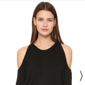 Tamara Mellon Cold Shoulder cashmere sweater in black.